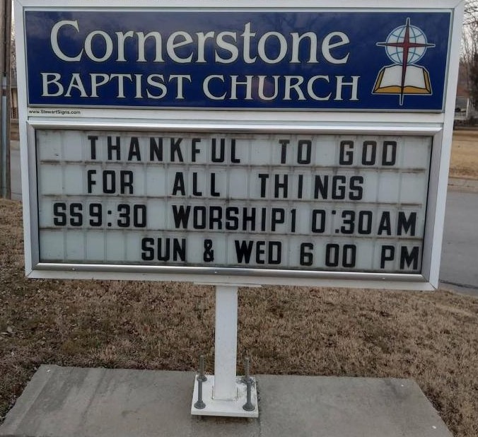 The Cornerstone Baptist Church sign: Thankful to God for all things. Sunday School 9:30, worship 10:30 AM.